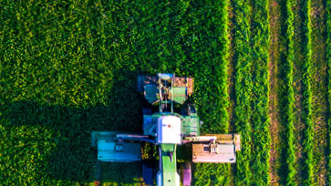 An agricultural vehicle in a field